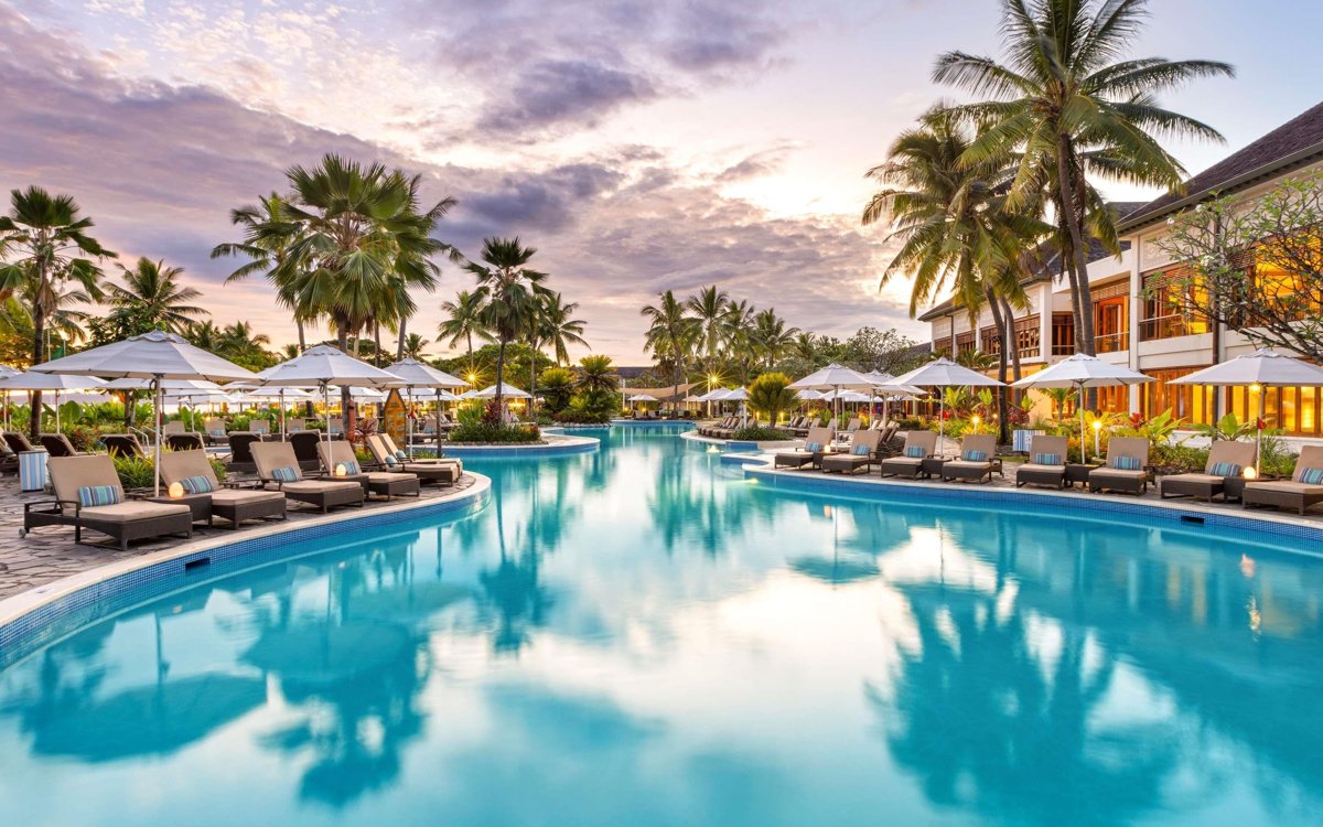 The pool at Sofitel Fiji Resort & Spa, Denarau, at sunset