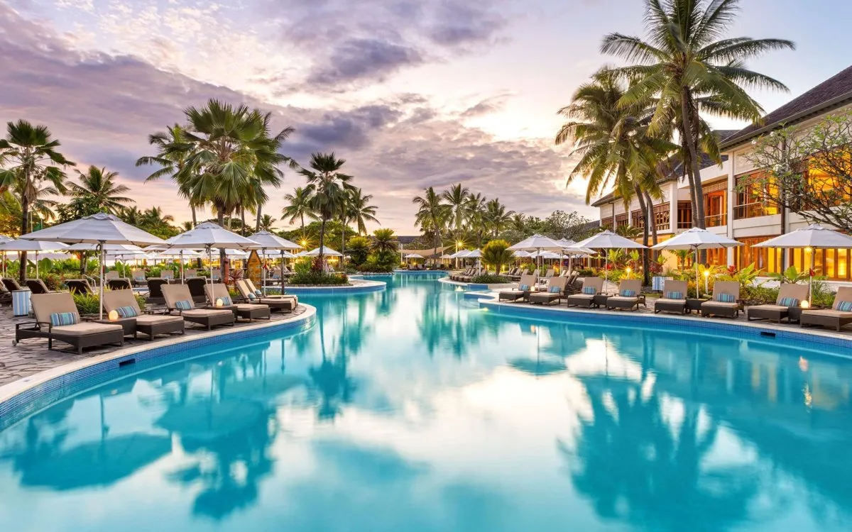 The pool at Sofitel Fiji Resort & Spa, Denarau, at sunset